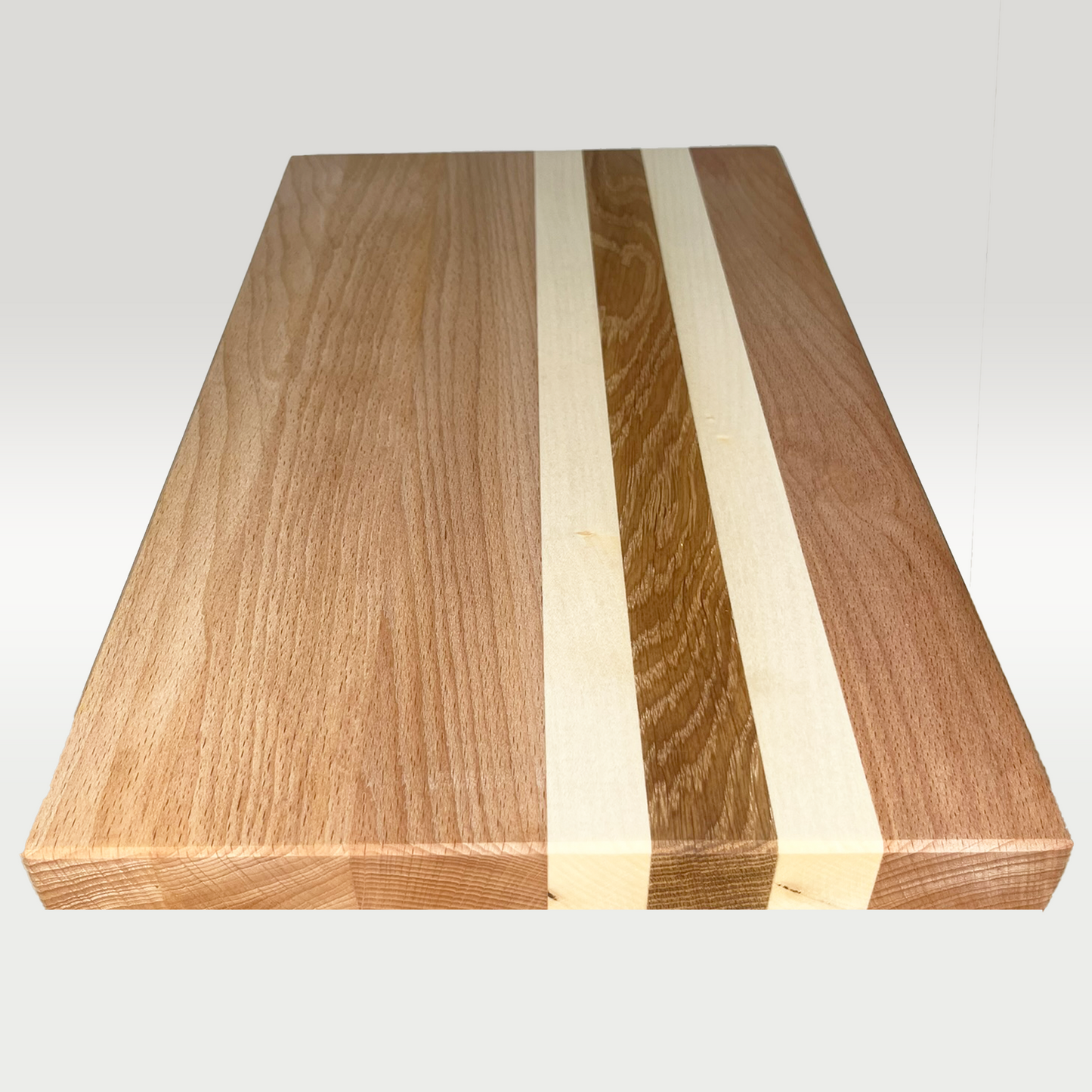 Large cutting board made of beech, maple and oak 